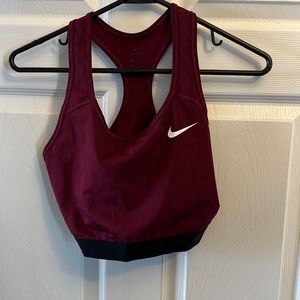 Nike. Women’s maroon sports bra size L.